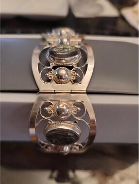 Taxco Sterling Silver Ornate Vintage Bracelet with abalone.